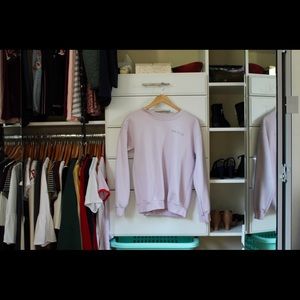 “you’re too close” pink sweater